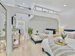 2 habitaciones, tabla de planchar con plancha, cuna de viaje y wifi