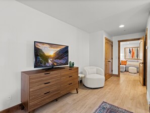 Smart TV, fireplace, books