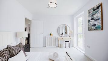 2 dormitorios, tabla de planchar con plancha, wifi gratis y ropa de cama