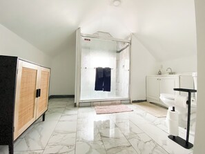 Shower, hair dryer, towels, soap