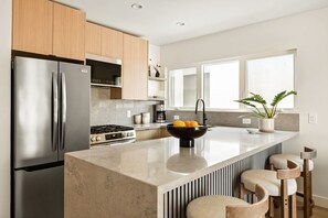 Fridge, microwave, oven, stovetop - Tide House - Unit C | Modern Seaside 1BD w Parking (Manhattan Beach)