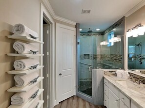 Shower, hair dryer, towels, soap