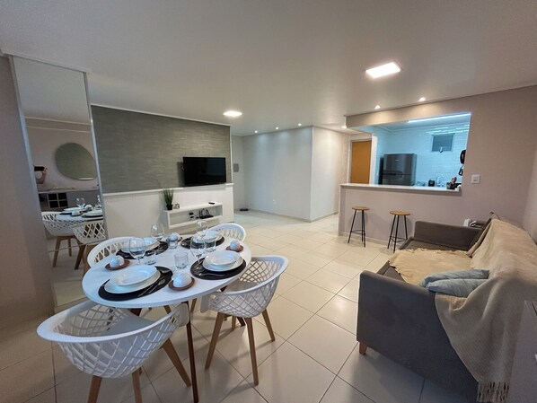 Comfort Apartment | Living room | Flat-screen TV