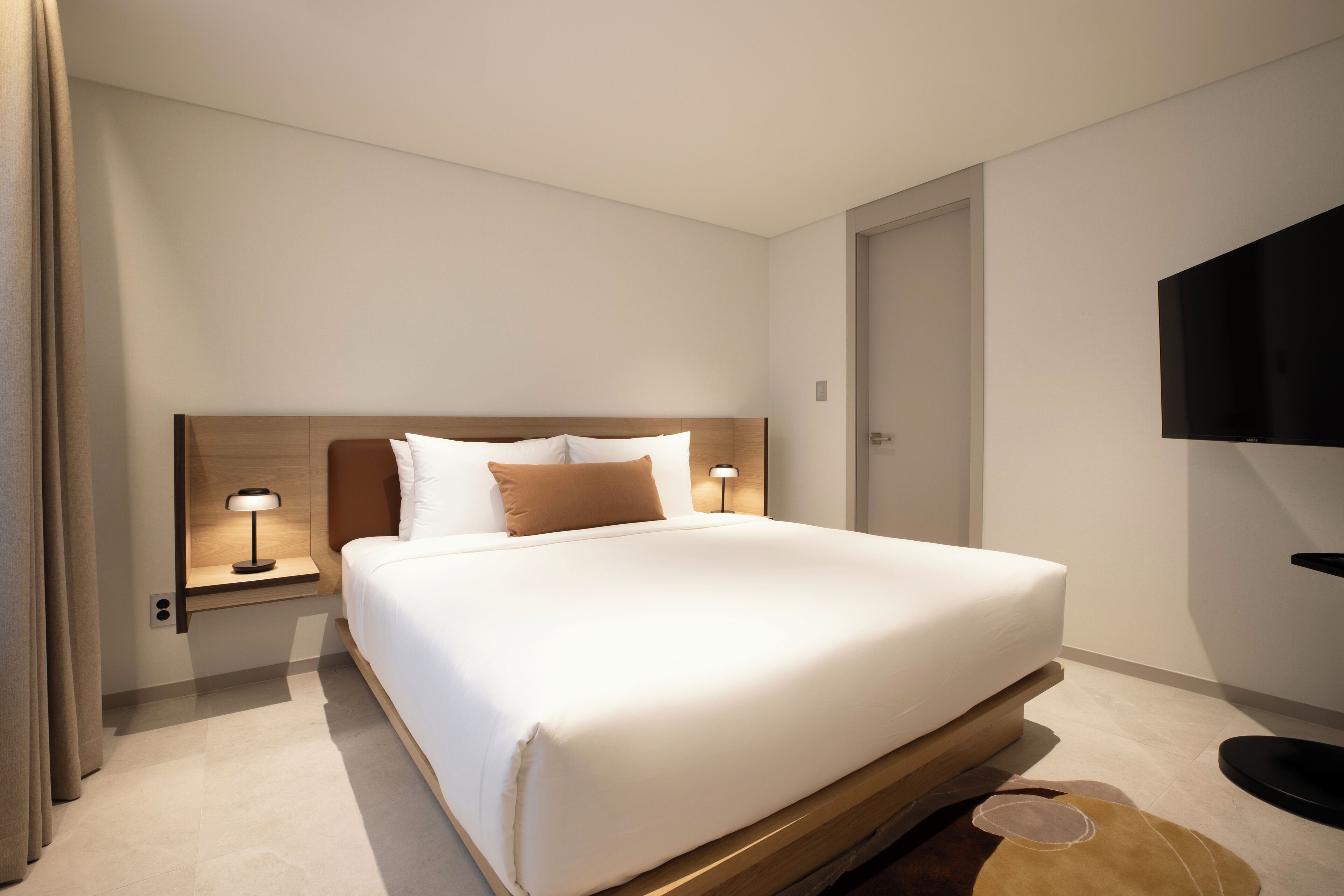 Familiestudio-suite | Arbejdsområde til bærbare computere, gratis Wi-Fi, sengetøj