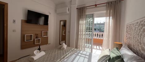 2 habitaciones, tabla de planchar con plancha y wifi gratis