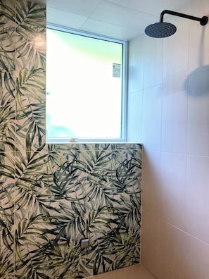Shower, towels, soap, toilet paper
