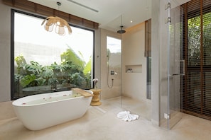 Shower, hair dryer, towels, soap