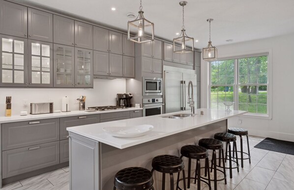 Microwave, oven, stovetop, dishwasher - Architecturally designed 4 bedroom home walking distance to downtown Wayzata (Wayzata)