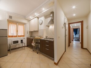 Fridge, microwave, cookware/dishes/utensils