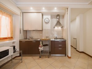 Fridge, microwave, cookware/dishes/utensils