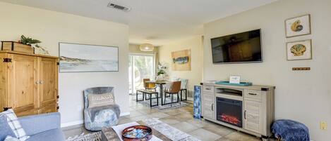 TV, fireplace, books