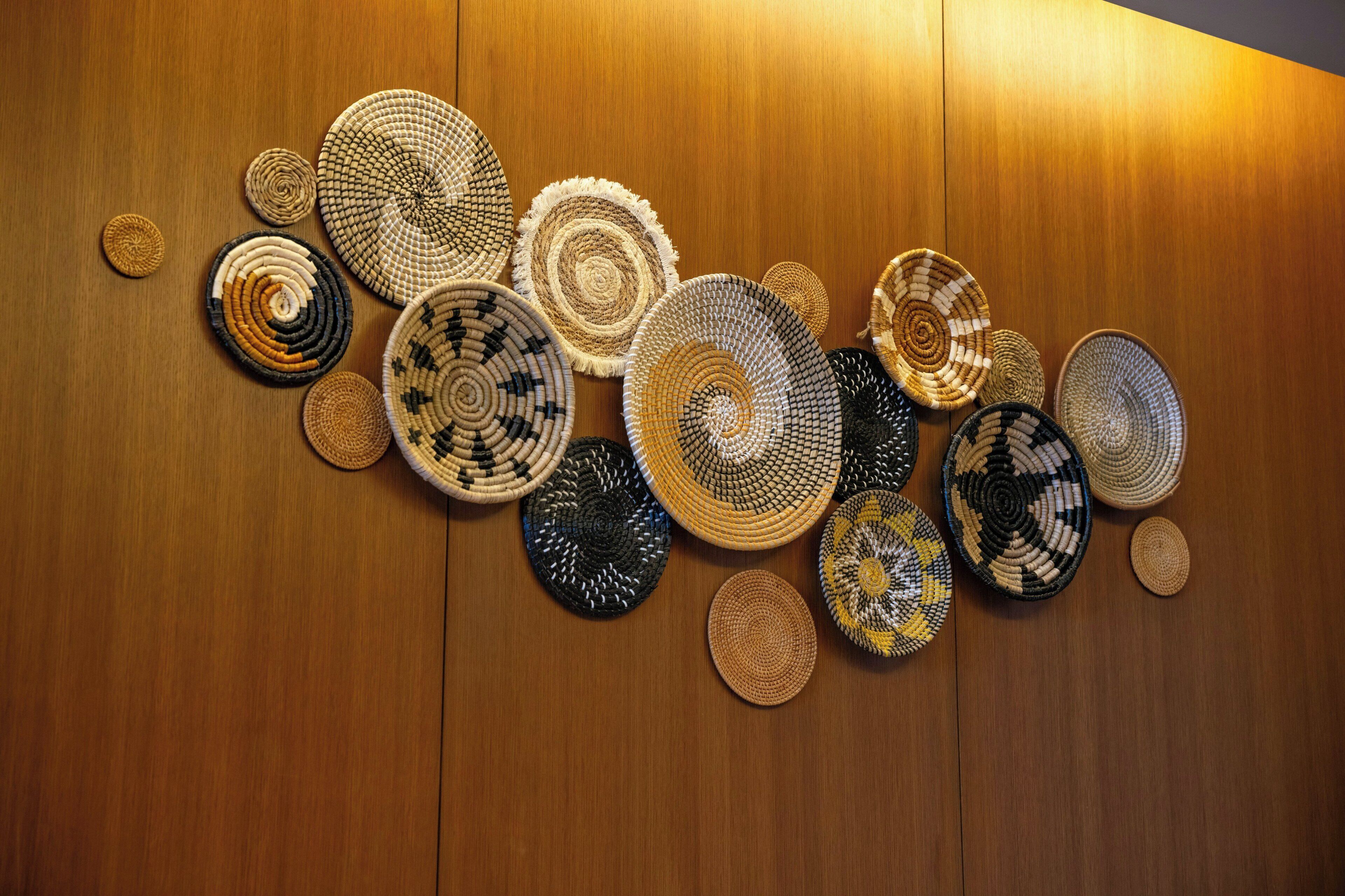 A collection of woven baskets on a wooden surface.