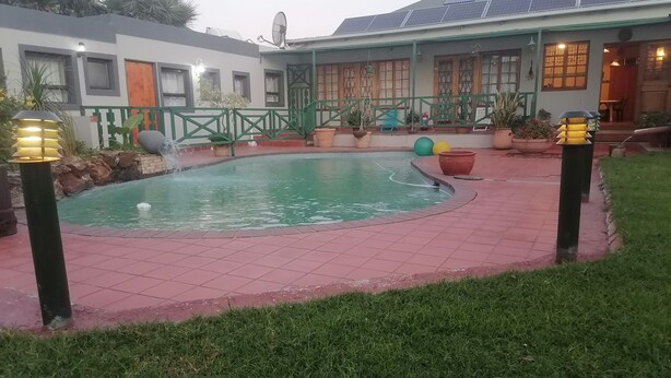 Deluxe Room, Pool View | Terrace/patio - Valleycenter GuestLodge  (Germiston)