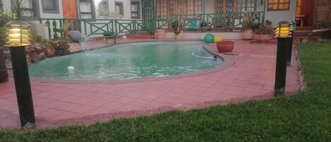 Deluxe Room, Pool View | Terrace/patio