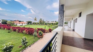Deluxe Room, Balcony, Garden View | Garden view