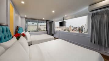 Family Suite Room With City View | Premium bedding, minibar, in-room safe, desk