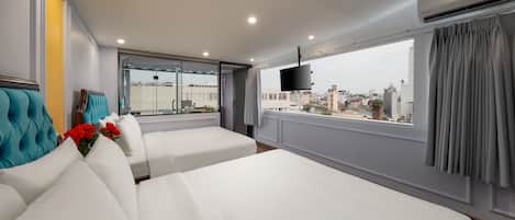 Family Suite Room With City View | Premium bedding, minibar, in-room safe, desk