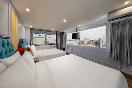 Family Suite Room With City View | Premium bedding, minibar, in-room safe, desk