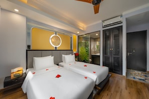 Chambre Deluxe Double ou avec lits jumeaux | Literie de qualité supérieure, minibar, coffres-forts dans les chambres