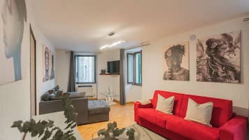 Apartment, Lake View (1 Bedroom) | Living area | 32-inch Smart TV with cable channels