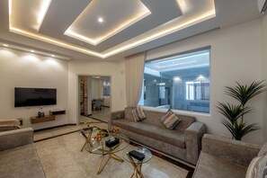 Villa, Balcony, Pool View | Living area | 60-inch Smart TV with satellite channels