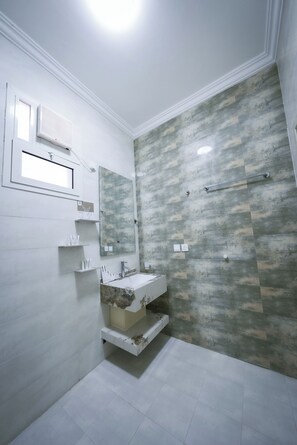 Villa, Balcony, Pool View | Bathroom | Shower, free toiletries, hair dryer, slippers