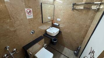 Shower, towels, soap, shampoo