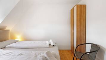 2 室のベッドルーム、WiFi (無料)、ベッドシーツ