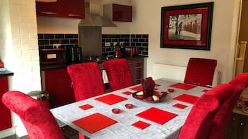 Room, 2 Bedrooms | Dining room