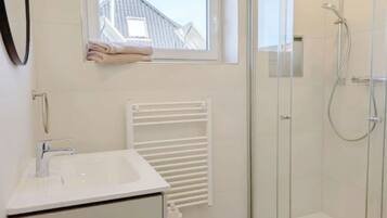 Dutxa, assecador de cabells i tovalloles