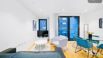 Leilighet, balkong, byutsikt | Spiseområde på rommet