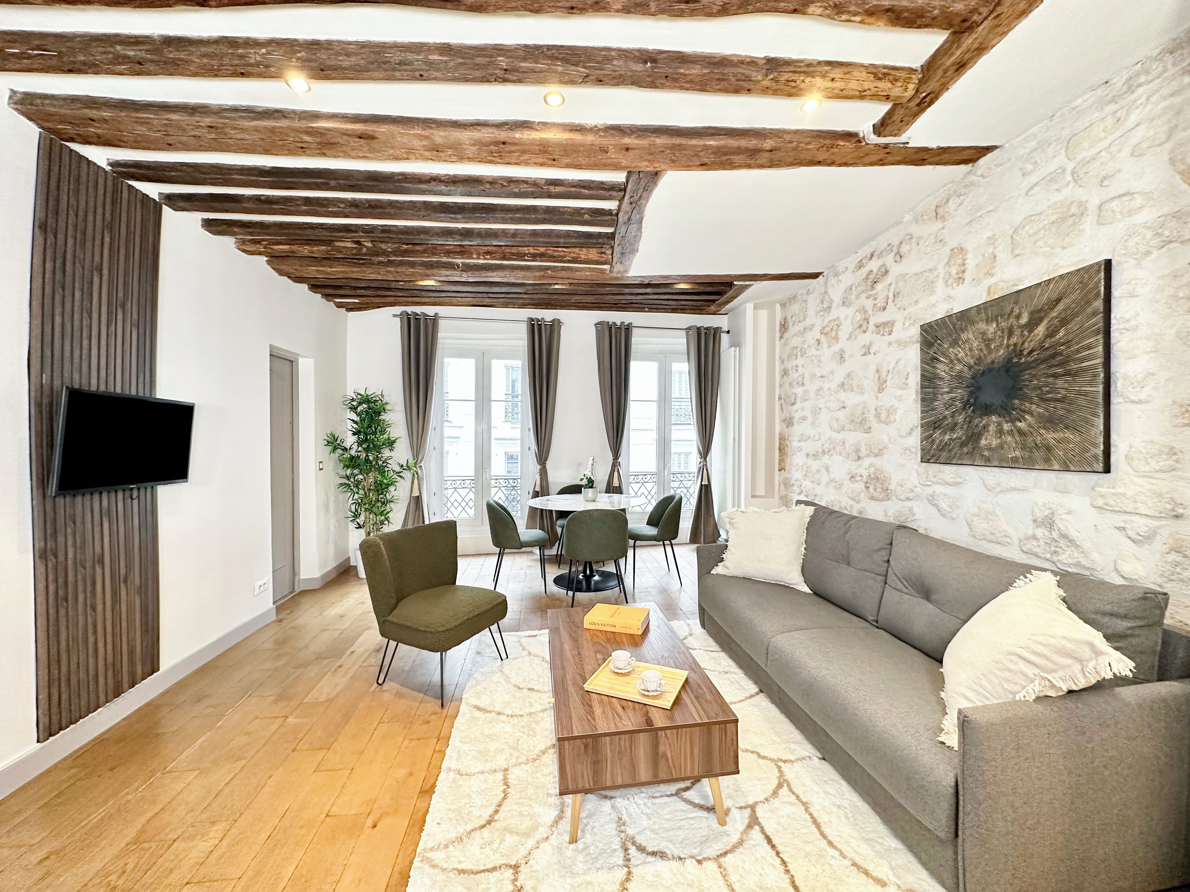 Comfort Apartment, City View | Living area | 80-cm Smart TV with digital channels