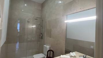 Hair dryer, towels, soap, toilet paper