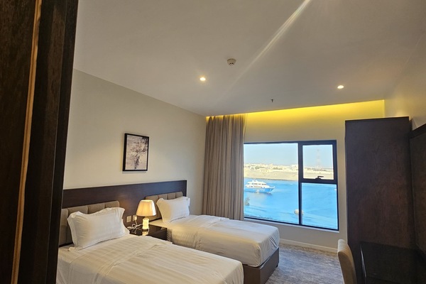 Twin Room, City View | Desk, laptop workspace, iron/ironing board, free WiFi