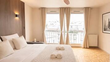 Comfort Studio, City View | Living area | 80-cm Smart TV with digital channels