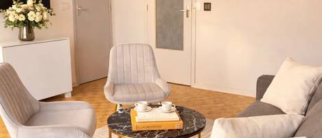 Comfort Studio, City View | Living area | 80-cm Smart TV with digital channels