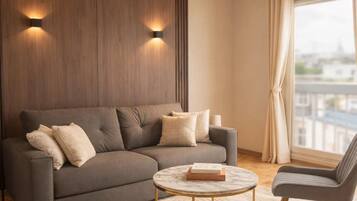 Comfort Studio, City View | Living area | 80-cm Smart TV with digital channels