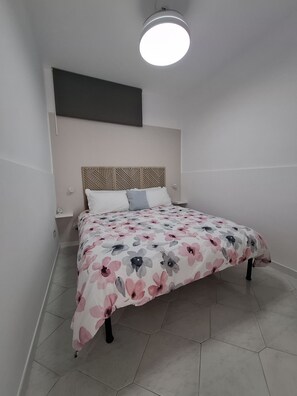 1 bedroom, desk, iron/ironing board, travel cot