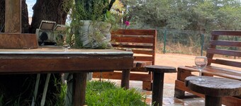 Relax in nature’s peace just minutes from Chobe River and wildlife.