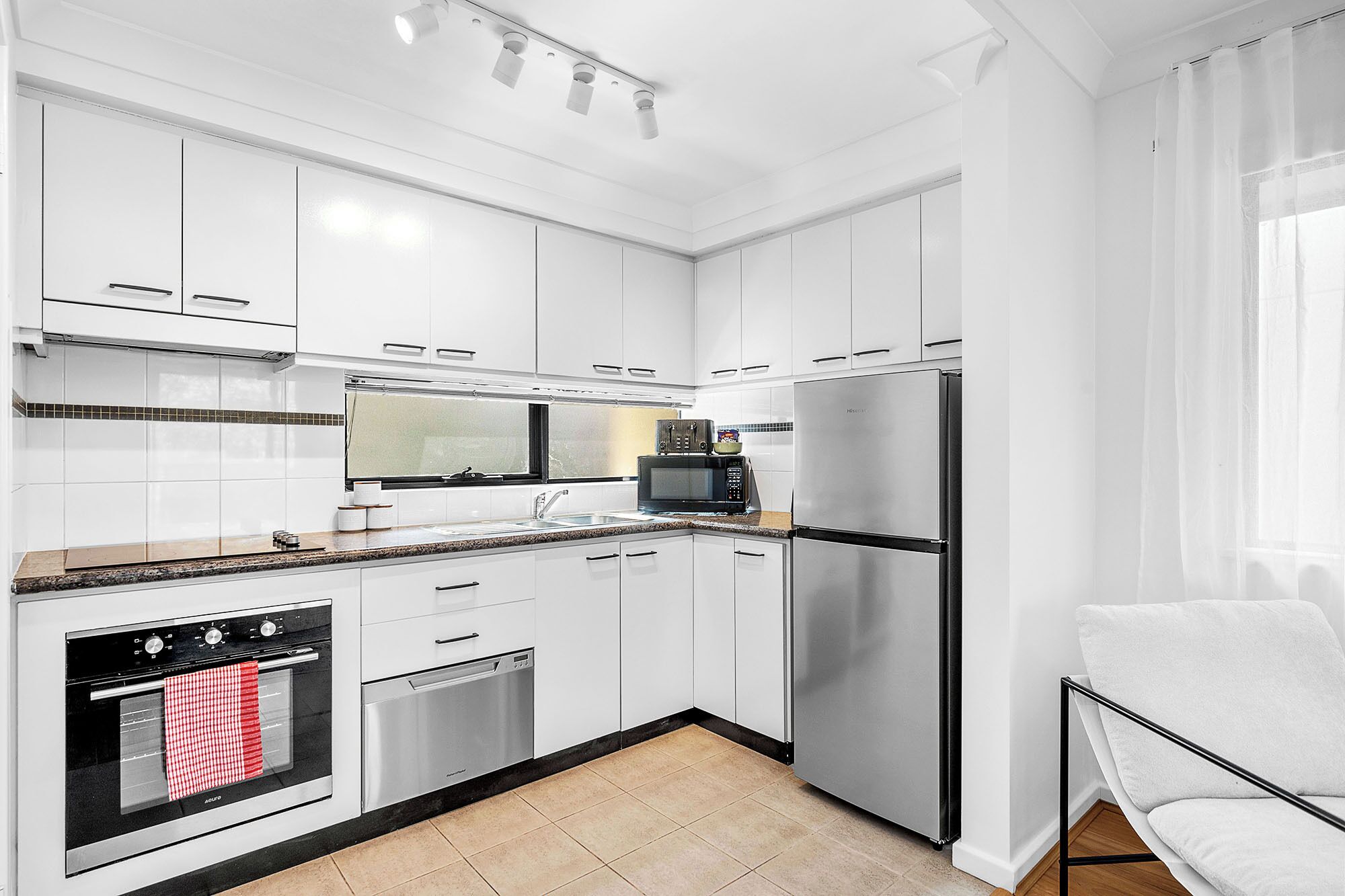Coffee/tea maker, fridge, microwave, oven
