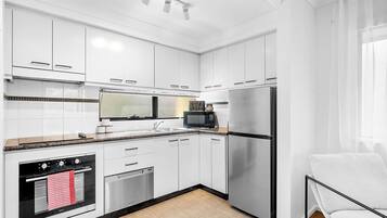 Coffee/tea maker, fridge, microwave, oven