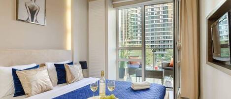 1 habitación, tabla de planchar con plancha, cuna de viaje y wifi