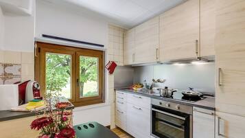 Family Chalet, Multiple Bedrooms, Mountainside (Casa Clelia) | Private kitchen | Fridge, oven, stovetop, coffee/tea maker