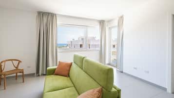 Apartamento luxo, vista para o mar | Área de estar