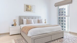 Apartemen, 2 kamar tidur, balkon, pemandangan kota | Brankas, setrika/meja setrika, dan Wi-Fi gratis