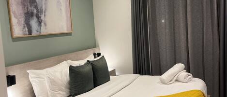 Blackout drapes, soundproofing, iron/ironing board, WiFi (free)