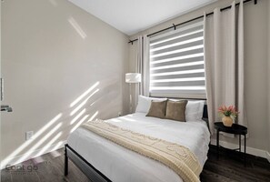 4 bedrooms, desk, iron/ironing board, travel cot