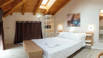 Suite junior | 1 habitación, caja de seguridad en la habitación y escritorio