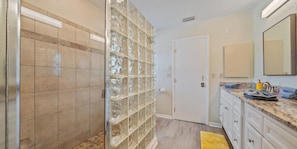 Shower, hair dryer, towels, soap