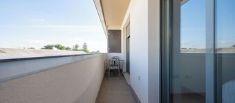 Centrally located with swimming pool and close to the train station